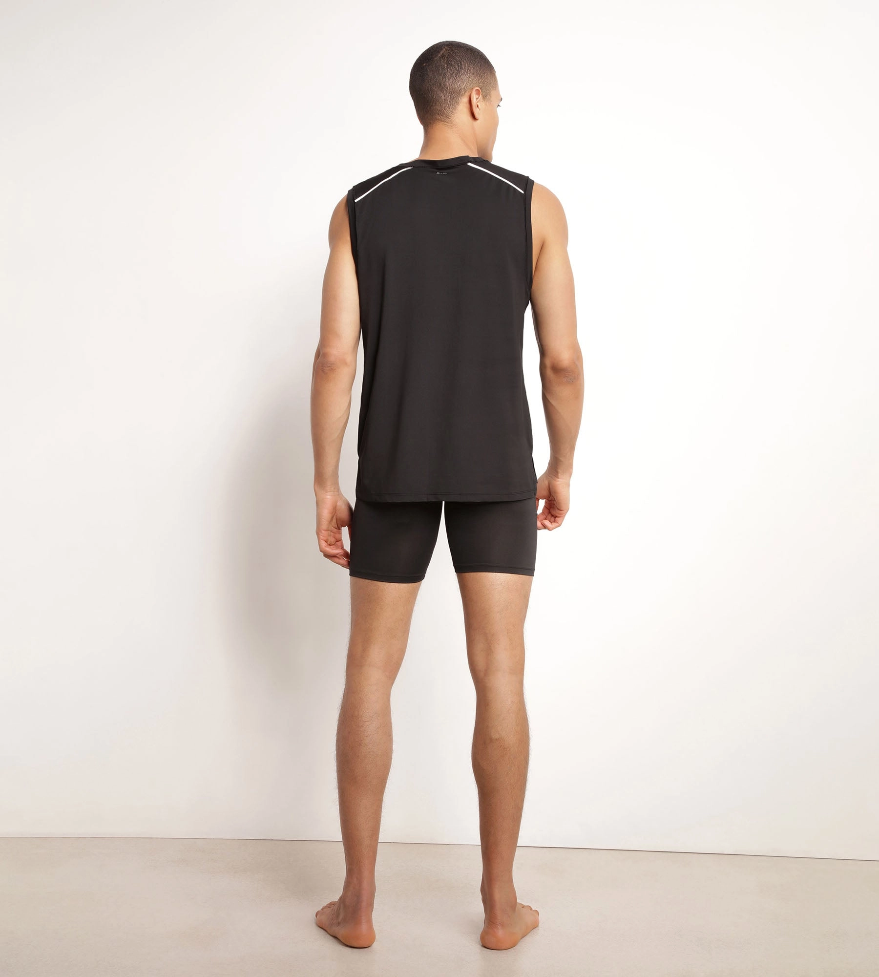 Débardeur de sport homme en matière aérée Noire Dim Move